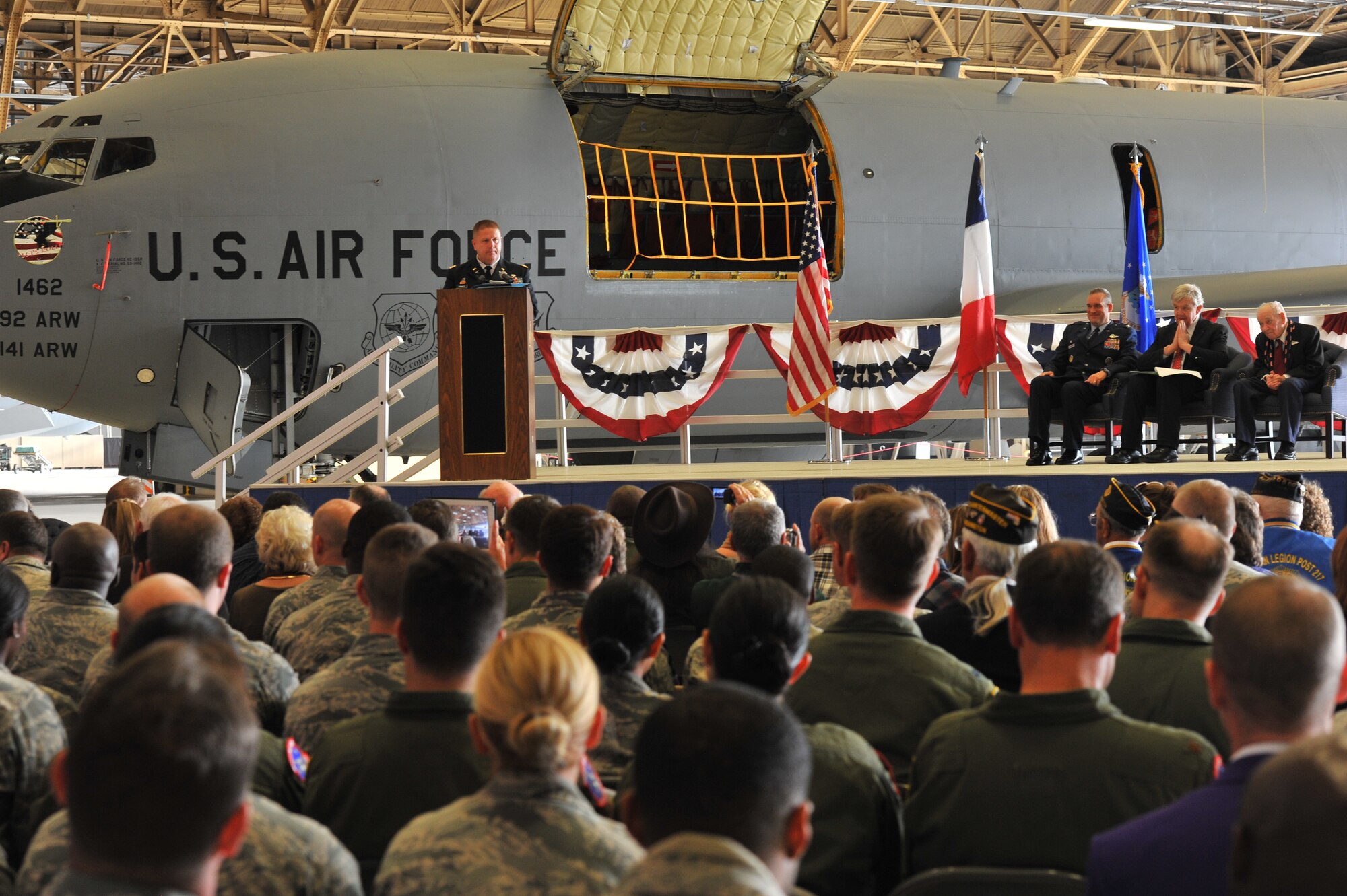 U.S. Army Lt. Col. Jeffery Grimes speaks about his uncle, U.S. Air Force retired Maj. Clarence Grimes on Oct. 25, 2013, at Fairchild Air Force Base, Wash., before his uncle is awarded the French Legion of Honor Medal. The medal is the highest recognition by the French government and was awarded for contributions almost 70 years ago to defend and preserve the independence of France. (U.S. Air Force photo by Staff Sgt. Veronica Montes/Released)