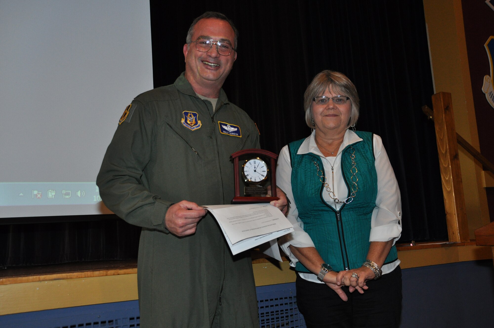 Phyllis Parkinson, 914th Airlift Wing, receives the 914 AW Semi-Annual Civilian Award (1st Half - CY 13) in the administrative category from Col. Walter Gordon, 914 AW commander, October 21, 2013 at the Niagara Falls Air Reserve Station, N.Y.  (U.S. Air Force photo by Master Sgt. Kevin Nichols)
