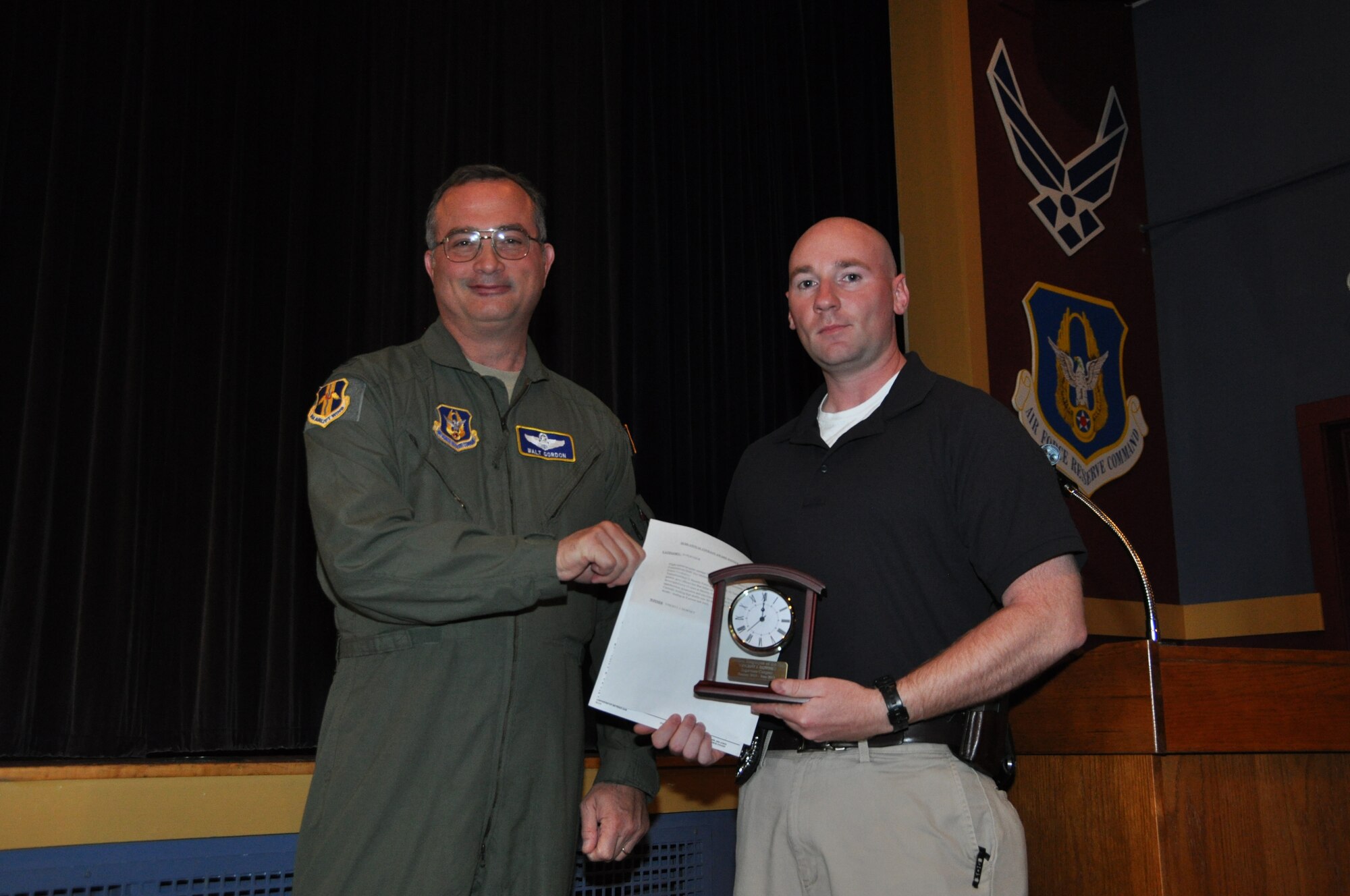 Vincent Downey (right), 914th Security Forces Squadron, receives the 914th Airlift Wing Semi-Annual Civilian Award (1st Half - CY 13) in the supervisor category from Col. Walter Gordon, 914 AW commander, October 21, 2013 at the Niagara Falls Air Reserve Station, N.Y.  (U.S. Air Force photo by Master Sgt. Kevin Nichols)