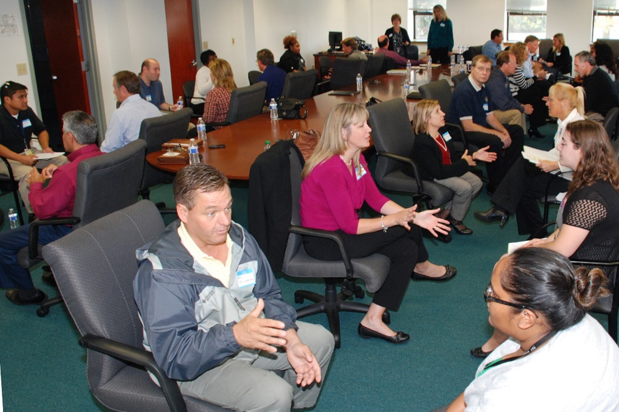 Mentors and mentees meet and discuss career development concerns during speed mentoring workshop at Naval Air Warfare Center Aircraft Division Oct. 22, 2013, at Joint Base McGuire-Dix-Lakehurst, N.J. (U.S. Navy photo by Tom Worsdale/Released)