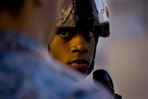 Senior Airman Arthur Moody, 91st Missile Security Forces member receives a briefing during the 91st Security Support Squadron tactical response force tryouts at Minot Air Force Base, N.D., Oct. 29. TRF is a rapidly employable and dynamic force capable of delivering fire from multiple weapons platforms.    (U.S. Air Force photo/Senior Airman Brittany Y. Auld)