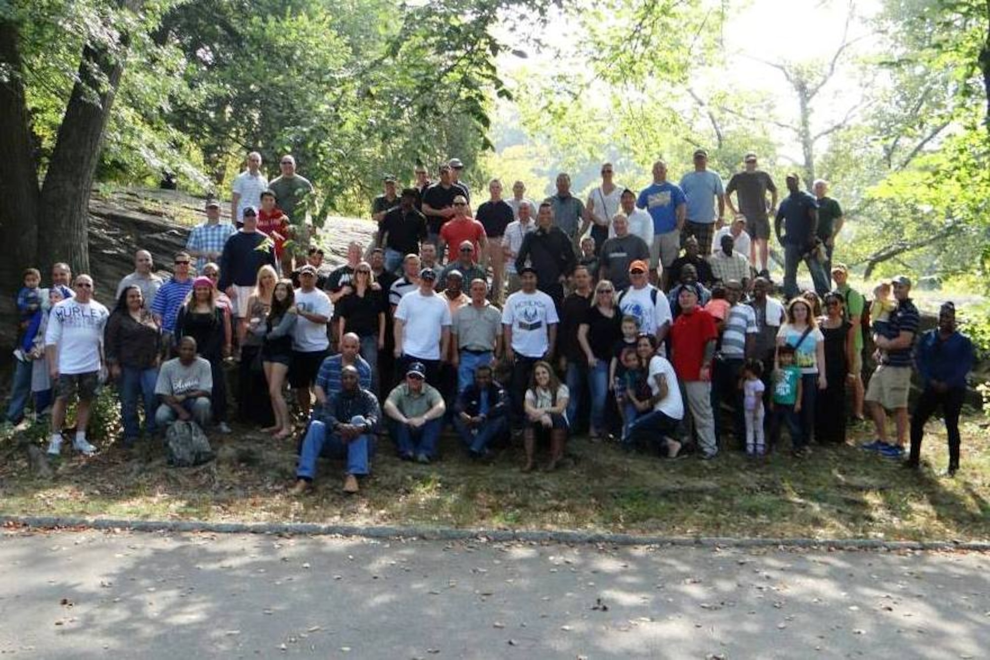 Soldiers and family members of 1-307th Infantry Regiment gather at the Memorial Grove in Central Park, New York City to discuss the history of the regiment during World War I and World War II. (U.S. Army photo/Sgt. 1st Class Billy Webb/Released)