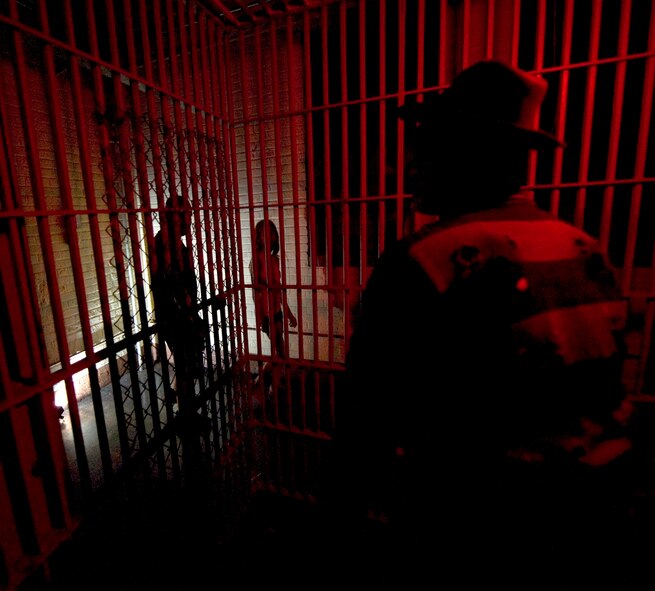 An Airman dressed as Freddy Krueger waits to scare unsuspecting patrons at the 2nd Civil Engineer Squadron's haunted house on Barksdale Air Force Base, La., Oct. 29, 2013. The annual haunted house, built by CE Airmen, has been running for more than 10 years. (U.S. Air Force photo/Senior Airman Sean Martin) 
