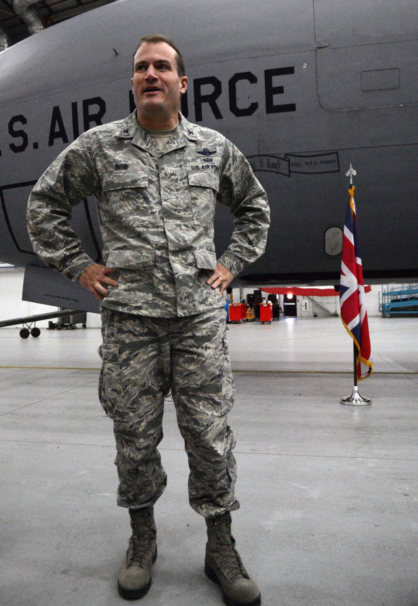 U.S. Air Force Col. Kenneth T. Bibb Jr., 100th Air Refueling Wing commander, speaks to members of Team Mildenhall during a dedicated crew chief ceremony Oct. 30, 2013, on RAF Mildenhall, England. This ceremony pays homage to a common practice in the U.S. Air Force where a maintainer is paired with a pilot on a specific aircraft. In this case the dedicated crew chief is paired up with Bibb on his dedicated aircraft. (U.S. Air Force photo by Airman 1st Class Kyla Gifford/Released)