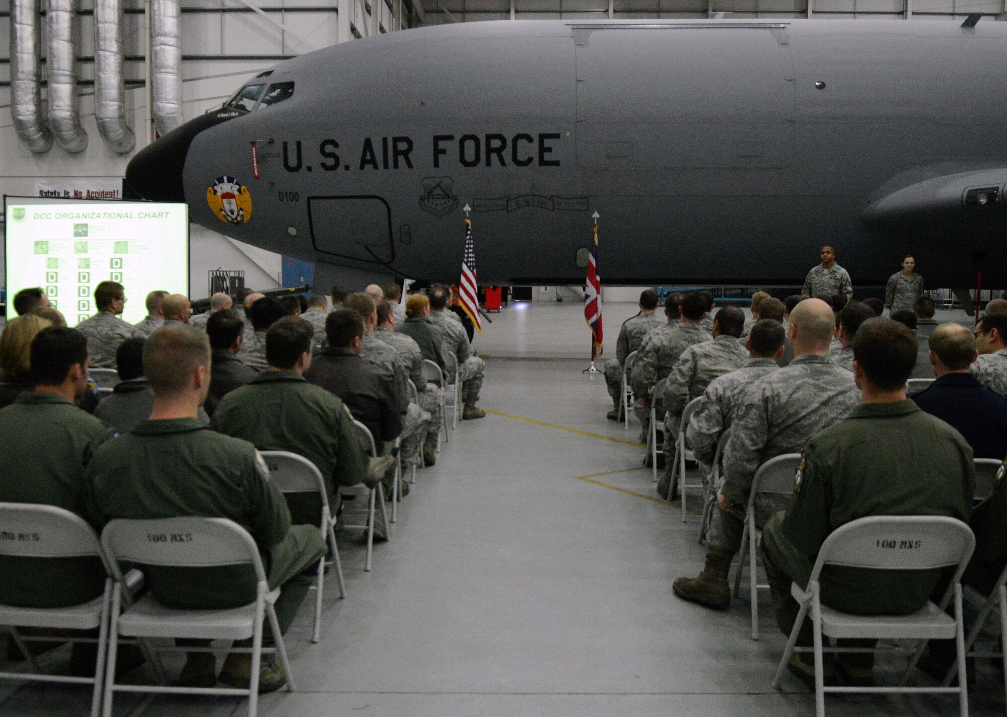 U.S. Air Force Tech. Sgt. Leonardo Riley, 100th Aircraft Maintenance Squadron dedicated crew chief program manager from Niagara Falls, N.Y., speaks to Team Mildenhall members during a dedicated crew chief ceremony Oct. 30, 2013, on RAF Mildenhall, England. This ceremony pays homage to a common practice in the U.S Air Force where a maintainer is paired with a pilot on a specific aircraft. (U.S. Air Force photo by Airman 1st Class Kyla Gifford/Released)