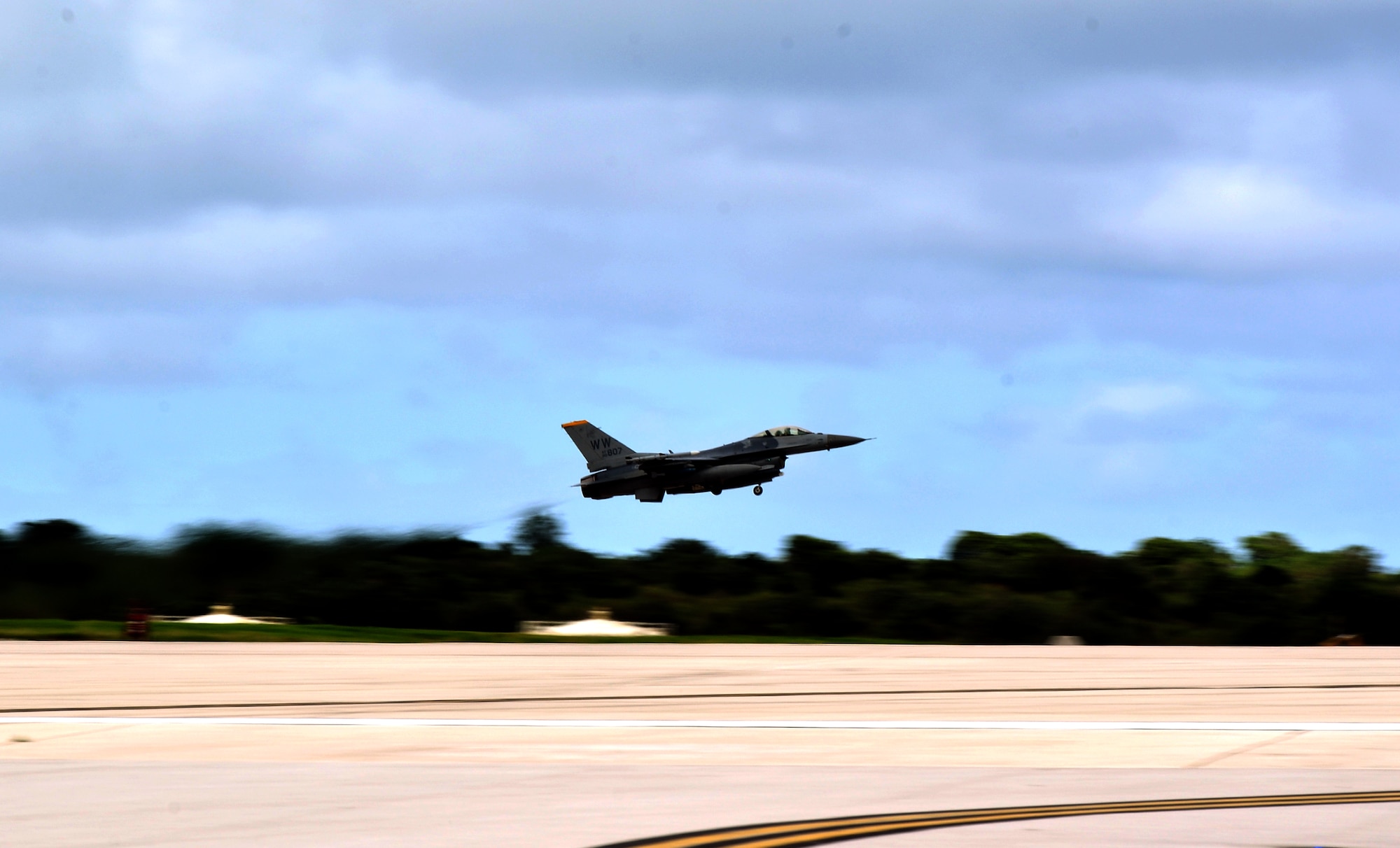 A 14th Fighter Squadron F-16 Fighting Falcon pilot from Misawa Air Base, Japan, takes off from Andersen Air Force Base, Guam, during a training mission  Oct. 29, 2013 The Airmen are from the 35th Fighter Wing at Misawa AB, and are here to gaining an opportunity to train in a less restricted air space.(U.S. Air Force photo by Airman 1st Class Mariah Haddenham/Released)