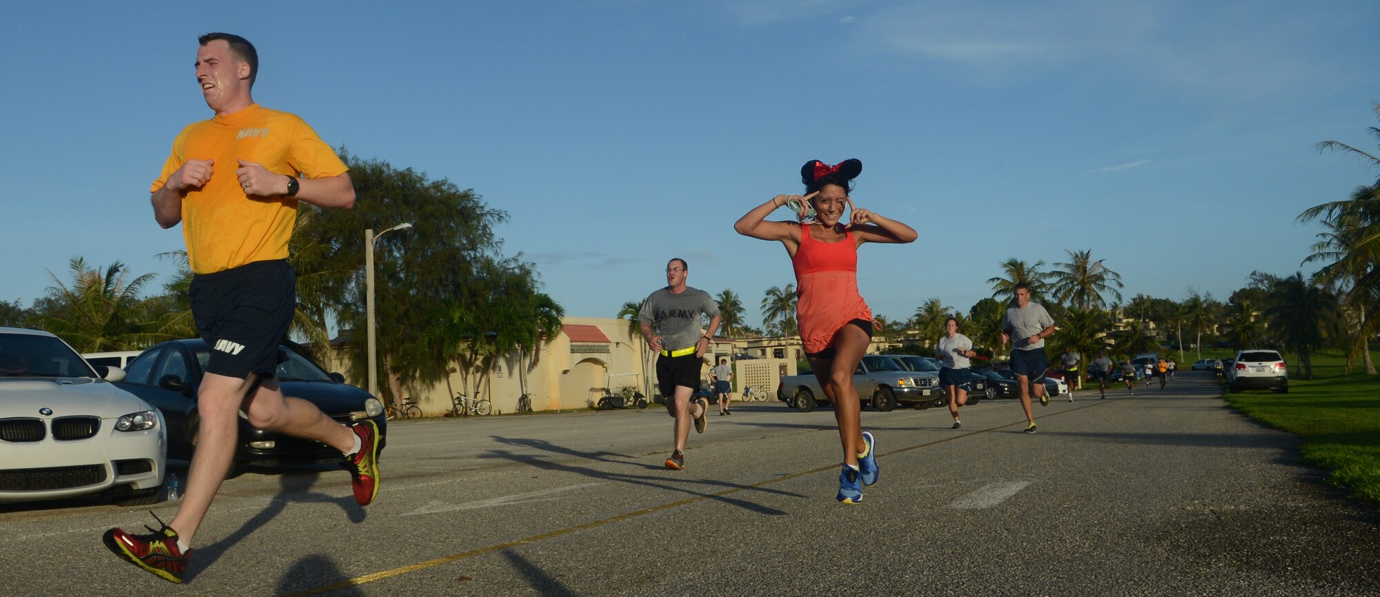 Participants finish the Halloween Hustle 5K Fun Run and Walk Oct. 30, 2013, on Andersen Air Force Base, Guam. Approximately 350 people participated in the Halloween Hustle as part of the monthly 5K event conducted by Coral Reef Fitness Center Airmen. (U.S. Air Force Photo by Airman 1st Class Emily A. Bradley/Released)