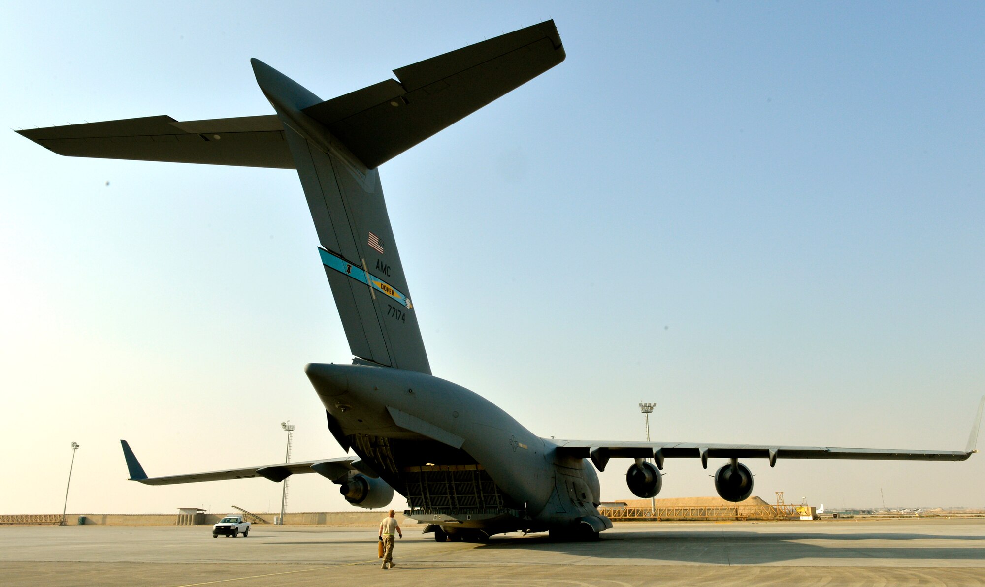 Senior Airman James Harrison, a 455th aerial port journeyman carries chalks to a C-17 on Forward Operating Base Mazar-E-Sharif, Afghanistan. Harrison is a native of and deployed from on his first deployment from Charleston, S.C.  (U.S. Air Force photo/Staff Sgt. Stephenie Wade)