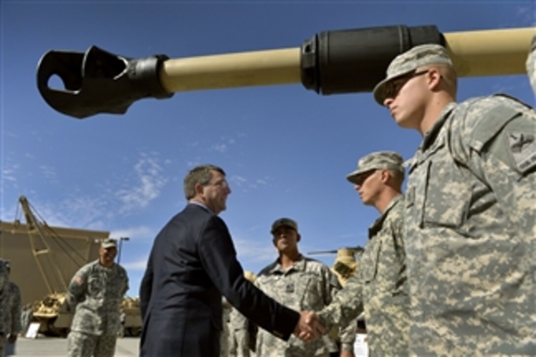 Deputy Secretary of Defense Ashton B. Carter thanks soldiers for their service as he visits the troops at the 1st Armored Division at Fort Bliss in El Paso, Texas, on Oct. 28, 2013.  