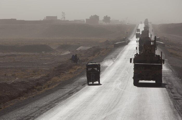 A combat logistics patrol conducted by Combat Logistics Regiment 2. Regional Command (Southwest), crests a hill in Helmand province, Afghanistan, during a resupply operation Aug. 22, 2013. More than 30 vehicles took part in the convoy, which provided simultaneous support to Forward Operating Bases Shir Ghazi and Shukvani.