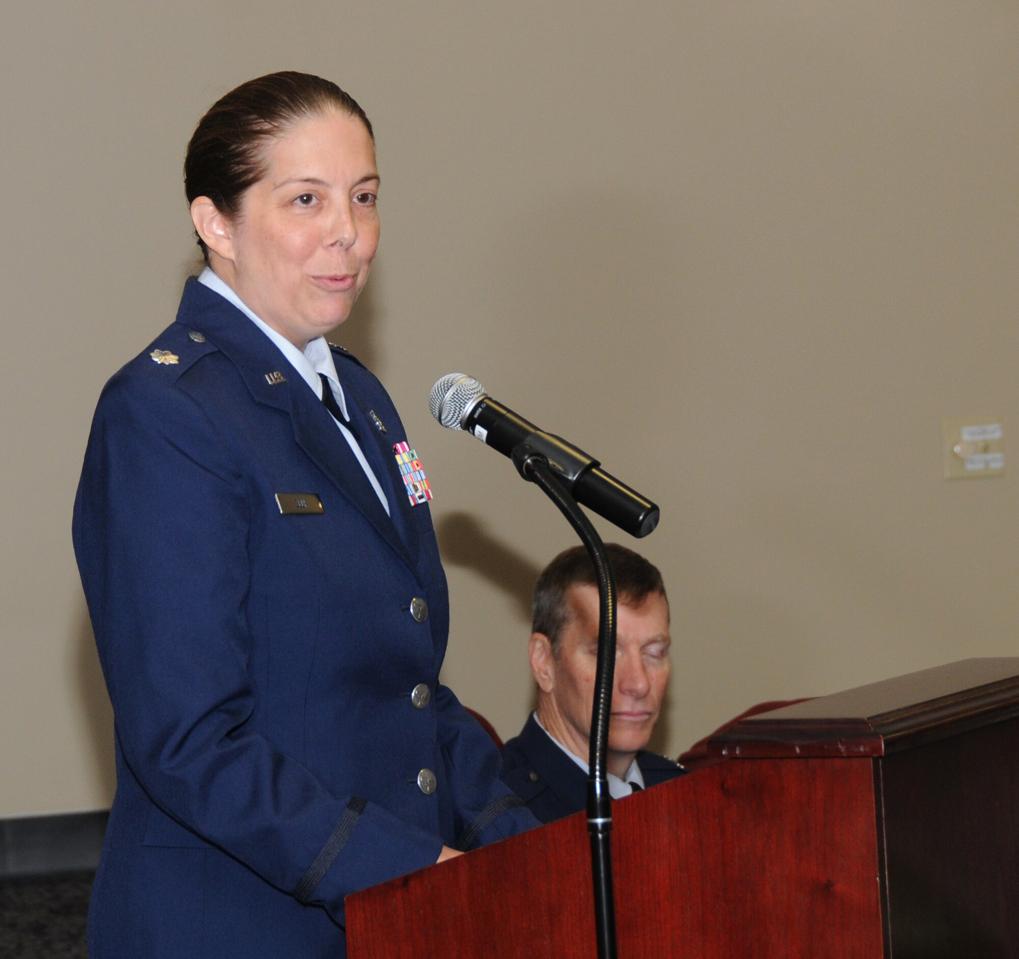 Lt. Col. Misty Zelk, new 188th Medical Group commander, delivers a speech at the 188th Medical Group’s change of command ceremony during August’s unit training assembly. Col. Paul Norris relinquished command of the group to Zelk during the ceremony. (U.S. Air National Guard photo by Senior Airman John Hillier/188th Fighter Wing Public Affairs)