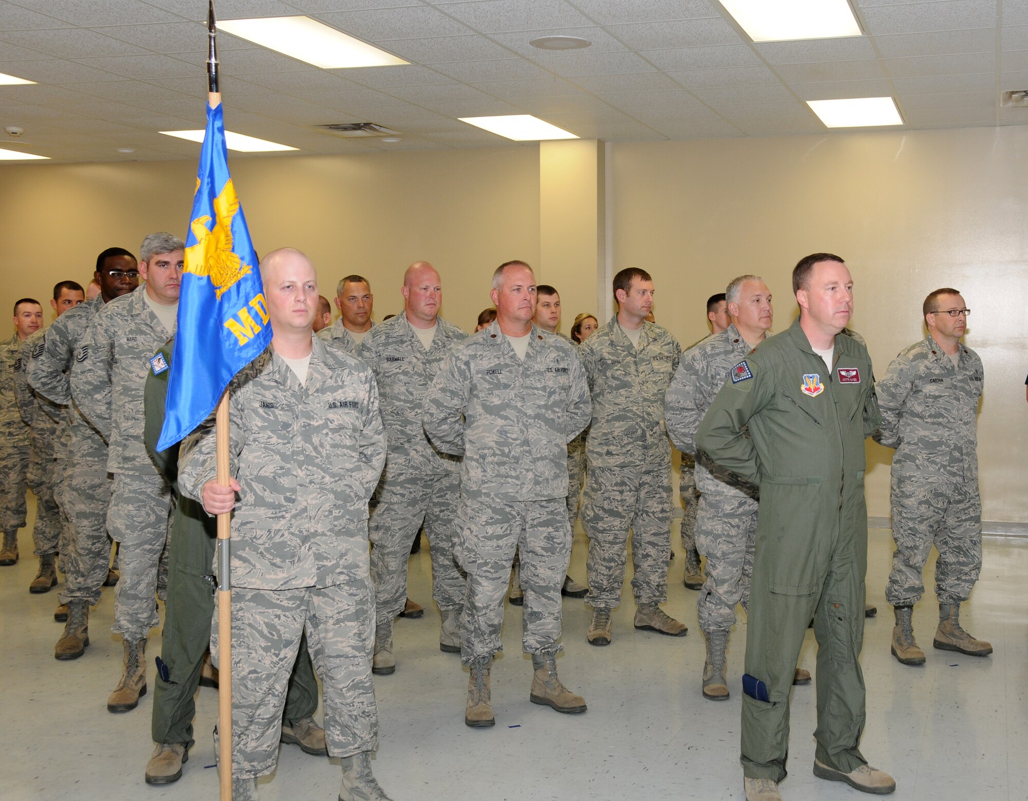 Members of the 188th Medical Group stand in formation at a change of command ceremony August 4, 2013. Col. Paul Norris relinquished command of the group to Lt. Col. Misty Zelk. (U.S. Air National Guard photo by Senior Airman John Hillier/188th Fighter Wing Public Affairs)