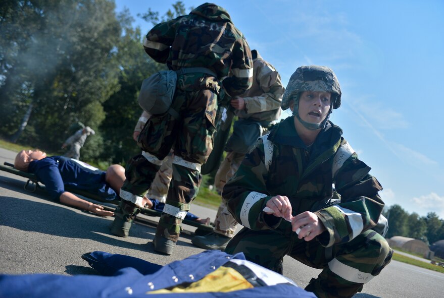 The 86th Civil Engineer Group challenged Airmen during a training scenario to measure readiness capabilities. Members of the 86th and 786th Civil Engineer squadrons simulated situations Airmen might face while in a deployed environment. Participants were drilled with a simulated mass causality incident, simulated mortar fire and the threat of a chemical attack. Mission-oriented protective posture equipment was also used to test mission capabilities during the exercise. (U.S. Air Force photos/Airman 1st Class Jordan Castelan)