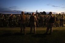 Marines and sailors attached to Combat Logistics Battalion 24, 2nd Marine Logistics Group stand in an accountability formation aboard Camp Allen, Va., prior to driving a convoy to Naval Amphibious Base Little Creek, Va., during a Defense Support of Civil Authorities, or DSCA, training exercise, Aug. 21, 2013. The service members conducted many of the operations, which would occur during a DSCA mission in the event of a natural disaster. 