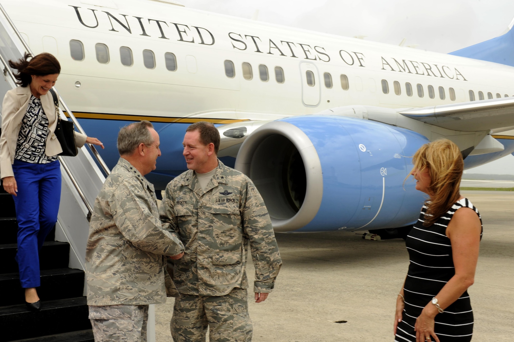 Air Force Chief of Staff Gen. Mark A. Welsh III is greeted by Brig. Gen. James Hecker Aug. 21, 2013, upon arrival to Kadena Air Base, Japan. During the visit, Welsh III and Chief Master Sergeant of the Air Force James A. Cody visited several units around the base and hosted an Airman’s call with 18th Wing Airmen, where they awarded five Distinguished Flying Crosses with valor. Welsh and Cody visited Kadena as part of a two-week visit to the region to thank Airmen and their families and discuss challenges and opportunities in the Pacific. (U.S. Air Force photo/Senior Airman Maeson L. Elleman)