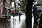 Soldiers with the New Jersey Army National Guard check on residents Wednesday in Hoboken, N.J.
