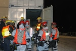 The 735th Search and Extraction Recon Team teams up with Missouri Task Force 1 to shore a building, making it structurally sound to enter and rescue victims. The task was done in response to the Vigilant Guard exercises that took place November 3-7, 2012 in Columbia Mo.