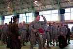 Pfc. Eric Greene of Bobtown, Pa., an infantryman with Company C, 1st Battalion, 14th Infantry Regiment out of Schofield Barracks, Hawaii, throws a ninja star with precision following a ninja demonstration on Nov. 5.