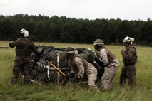 Marines with Marine Heavy Helicopter Training Squadron 302 participated in an external load training event with the Logistics Operations School, Aug. 14.
