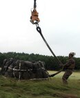 Marines with Marine Heavy Helicopter Training Squadron 302 participated in an external load training event with the Logistics Operations School, Aug. 14.
