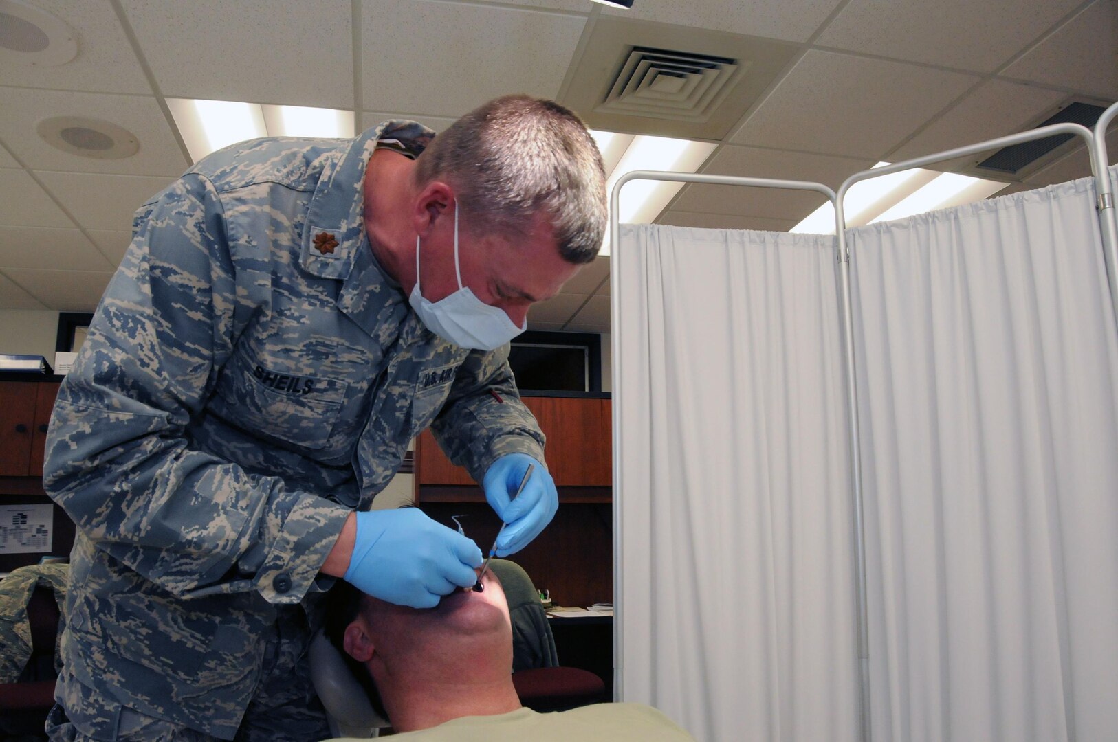 Maj. Mark Sheils, dentist for the 184th Medical Group, is the first dentist the wing has had for a very long time. Sheils travels from Fargo, N.D., to attend monthly unit training assemblies.