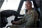 U.S. Army Chief Warrant Officer 2 Blaine Wyckoff, B Company, 3-238th, sits in the pilot's seat of a CH-47 Chinook helicopter at Forward Operating Base Salerno, Afghanistan, Oct. 20, 2012.