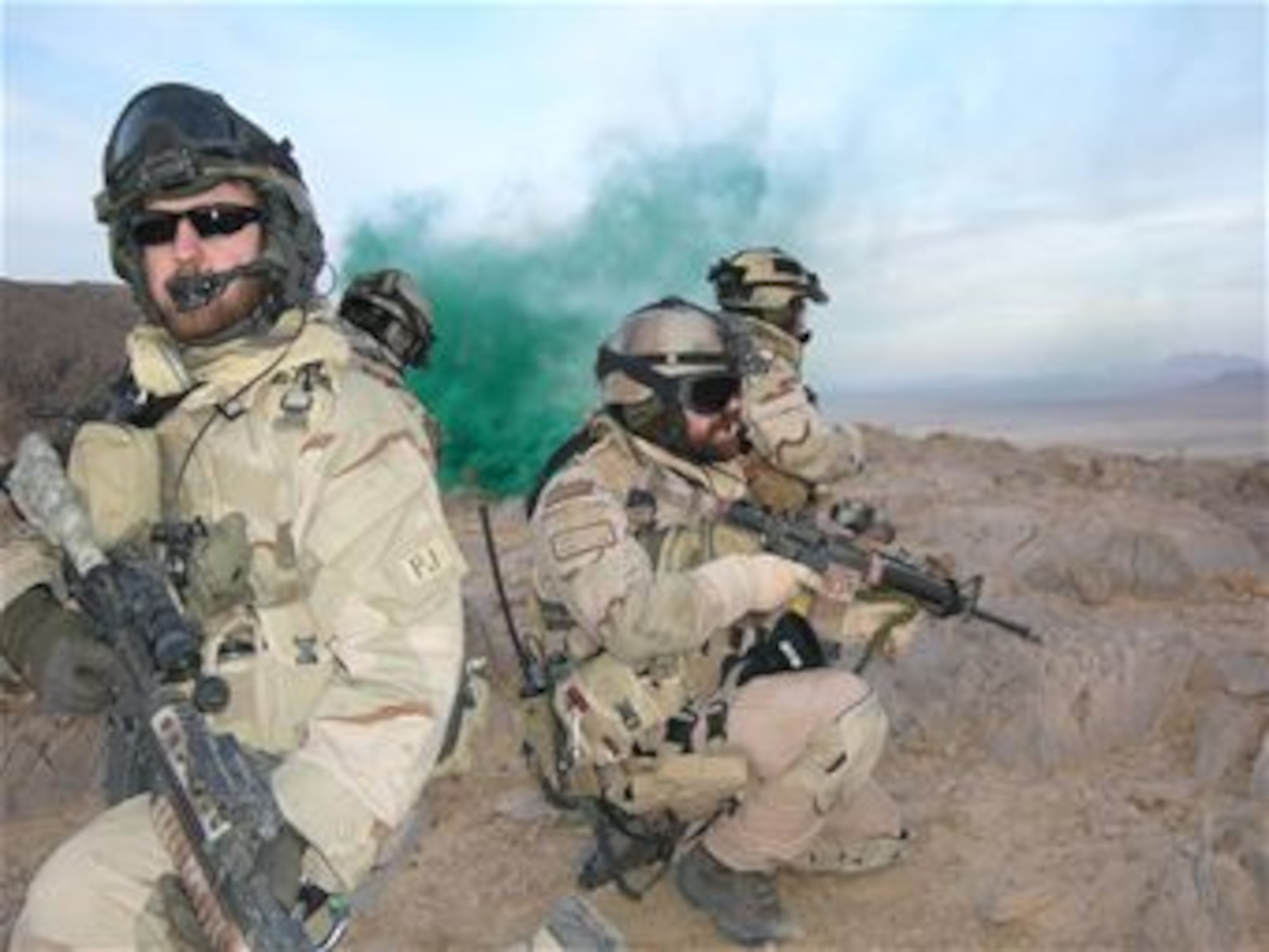 Senior Airman Brandon Daugherty, then-Master Sgt. Jeremy Hardy and Staff Sgt. Jason Blettenburg keep close watch during a combat rescue for an injured Afghan National Police soldier in Kandahar Province, Afghanistan Nov. 2007. (U.S. Air Force/Courtesy photo)