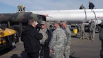 New York Army National Guard logistics experts speak Nov. 5, 2012, with New York City Office of Emergency Management officials at the Logistical Support Area established here.