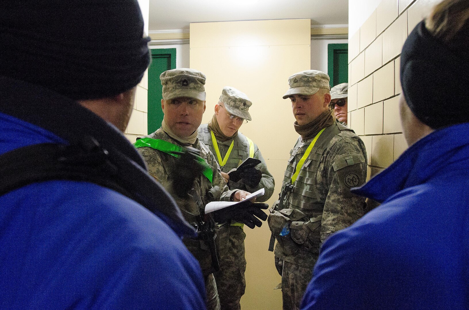 Army National Guard Sgt. 1st Class Luke Simon, of Buffalo, leads a team of soldiers from B. Troop, along with first responders through an apartment complex in New York City Nov. 9, 2012.