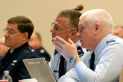 Maj. Gen. L. Scott Rice, the chief of staff of the Massachusetts Air National Guard, right, speaks with Brig. Gen. Steve Cray, the ANG Strategic Planning System vice chairman, during the ANG SPS at the National Convention Center, Leesburg, Va., Nov. 13, 2012.