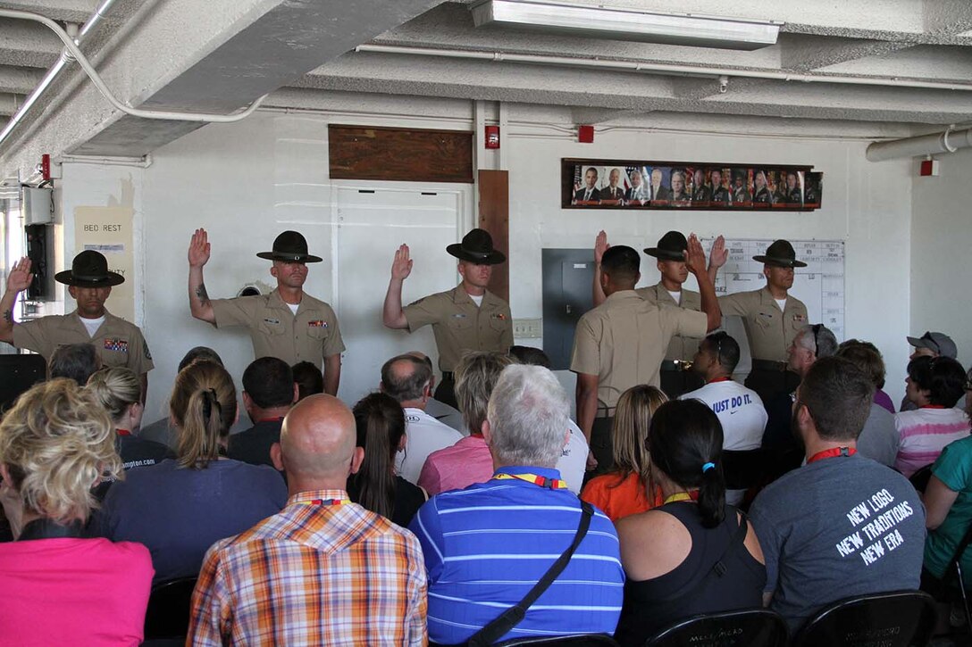 RS Des Moines and Indianapolis educators watch as they are given a mock pick-up brief aboard Marine Corps Recruit Depot San Diego, Calif., during the 2013 Educators Workshop on August 6.