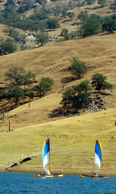 Two Sierra Sailing Club members enjoy a sunny day on Lake Kaweah, Calif., Aug. 22, 2013. 