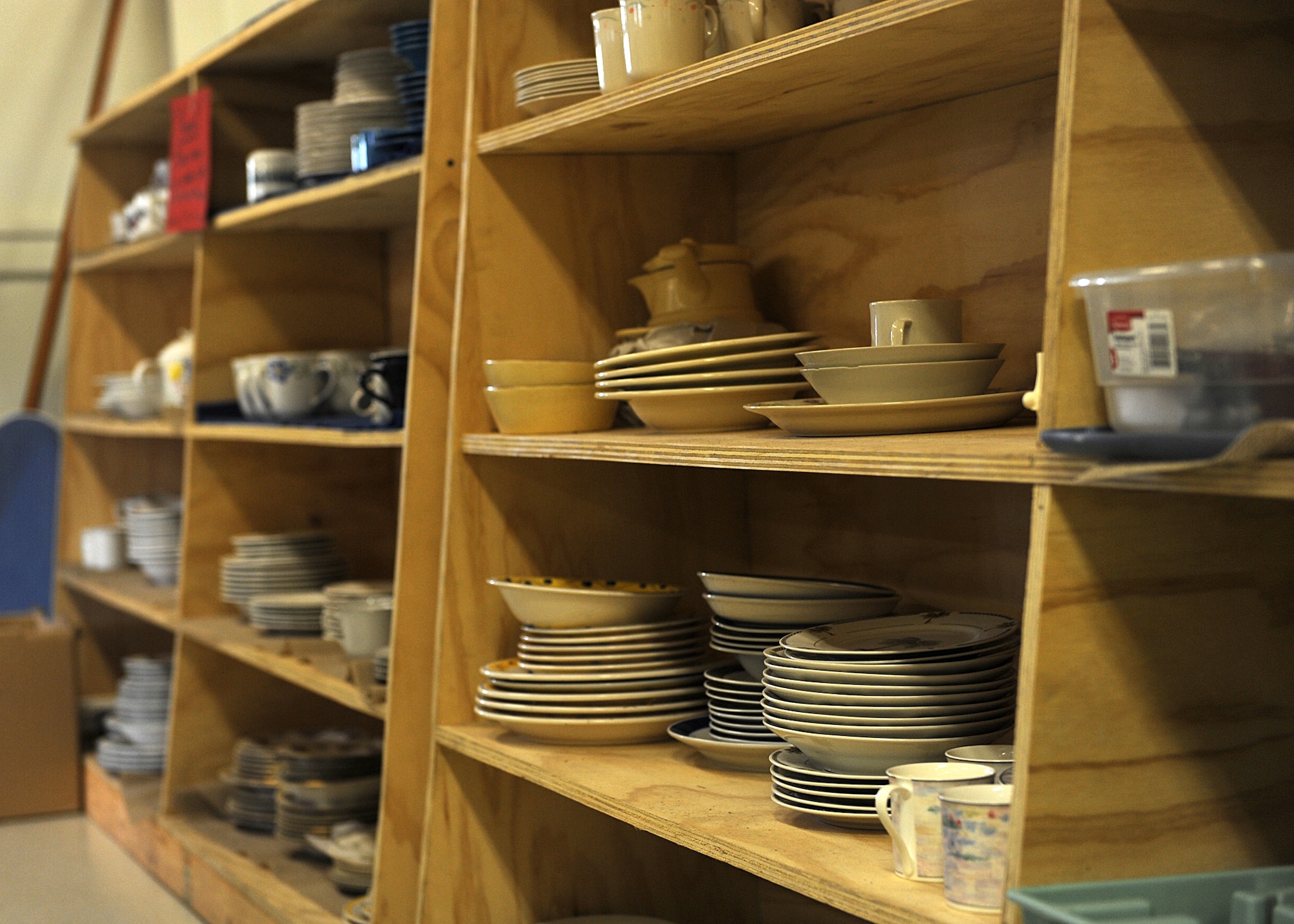 The Airman’s Attic takes repurposed household goods and makes them available to more than 1,800 families at Langley Air Force Base, Va.  Shoppers must complete an individual family data card prior to shopping. (U.S. Air Force photo by Senior Airman Brittany Paerschke-O’Brien/Released)
