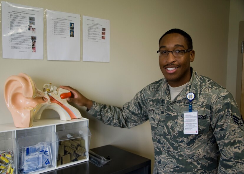 Senior Airman Delvin Darien, 436th Medical Group occupational health technician, talks about proper hearing protection and how it affects the ear Aug. 29, 2013, on Dover Air Force Base, Del. Darien’s supervisor, Staff Sgt Britini Jennie, believes he is a natural born leader and has an excellent work ethic. (U.S. Air Force photo/Senior Airman Jared Duhon)