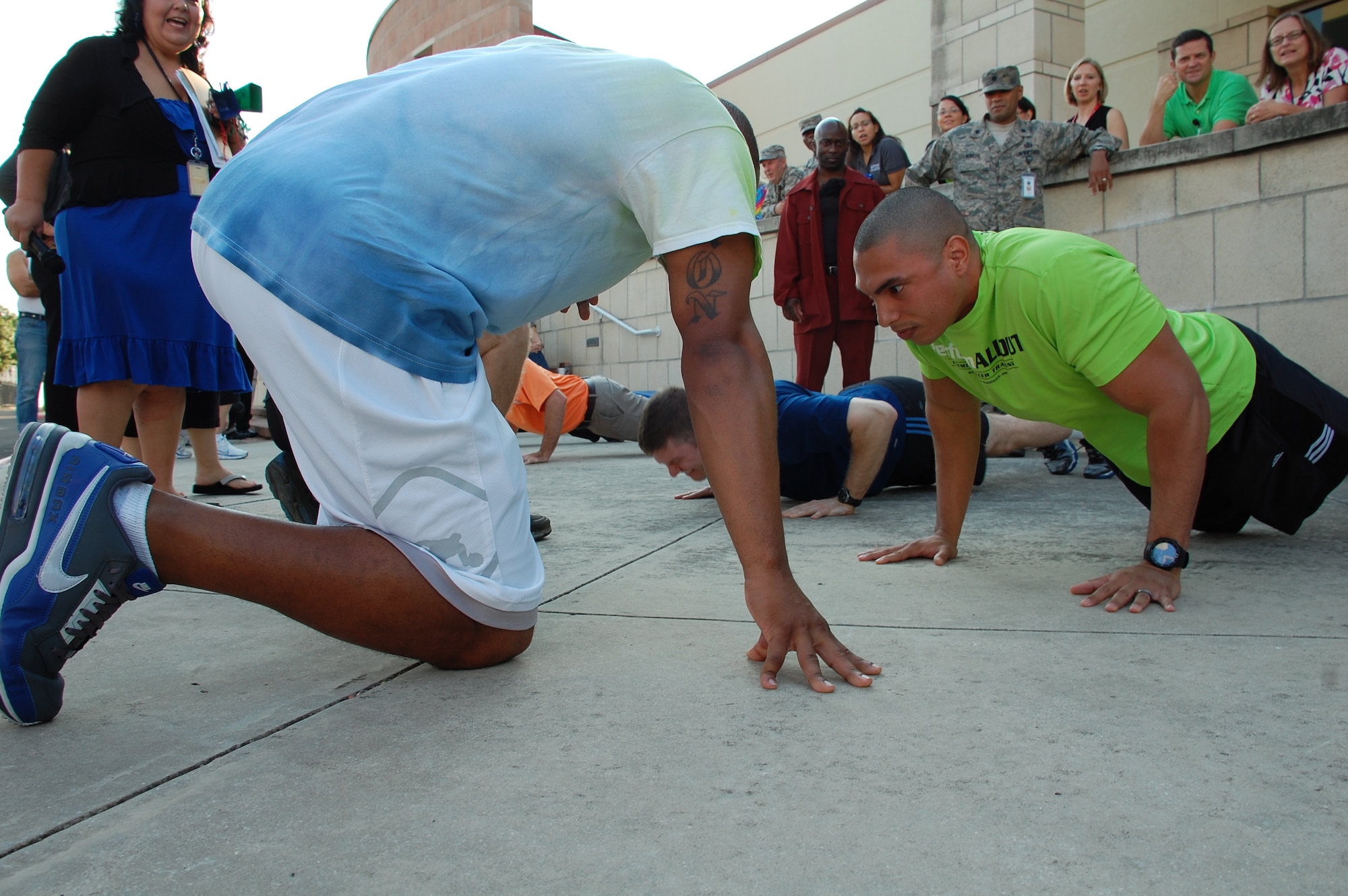 JOINT BASE SAN ANTONIO-LACKLAND, Texas -- The Air Force Civil Engineer Center held its inaugural AFCEC Fitness Competition and Health Fair Aug. 29 with competitors showing their athletic skills during five events -- sit-ups, pushups, cycling, walking and running. (U.S. Air Force photo/Debbie Aragon)