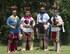 Osage Nation relatives of Maj. Gen. Clarence L. Tinker, dressed in native attire, sing and dance to a song written to Tinker during their annual four day celebration called In-lon-shka held in Pawhuska Indian Village, Okla., June 30, 2013. Tinker was the highest ranking officer of Native-American ancestry and the first general lost in action during World War II.