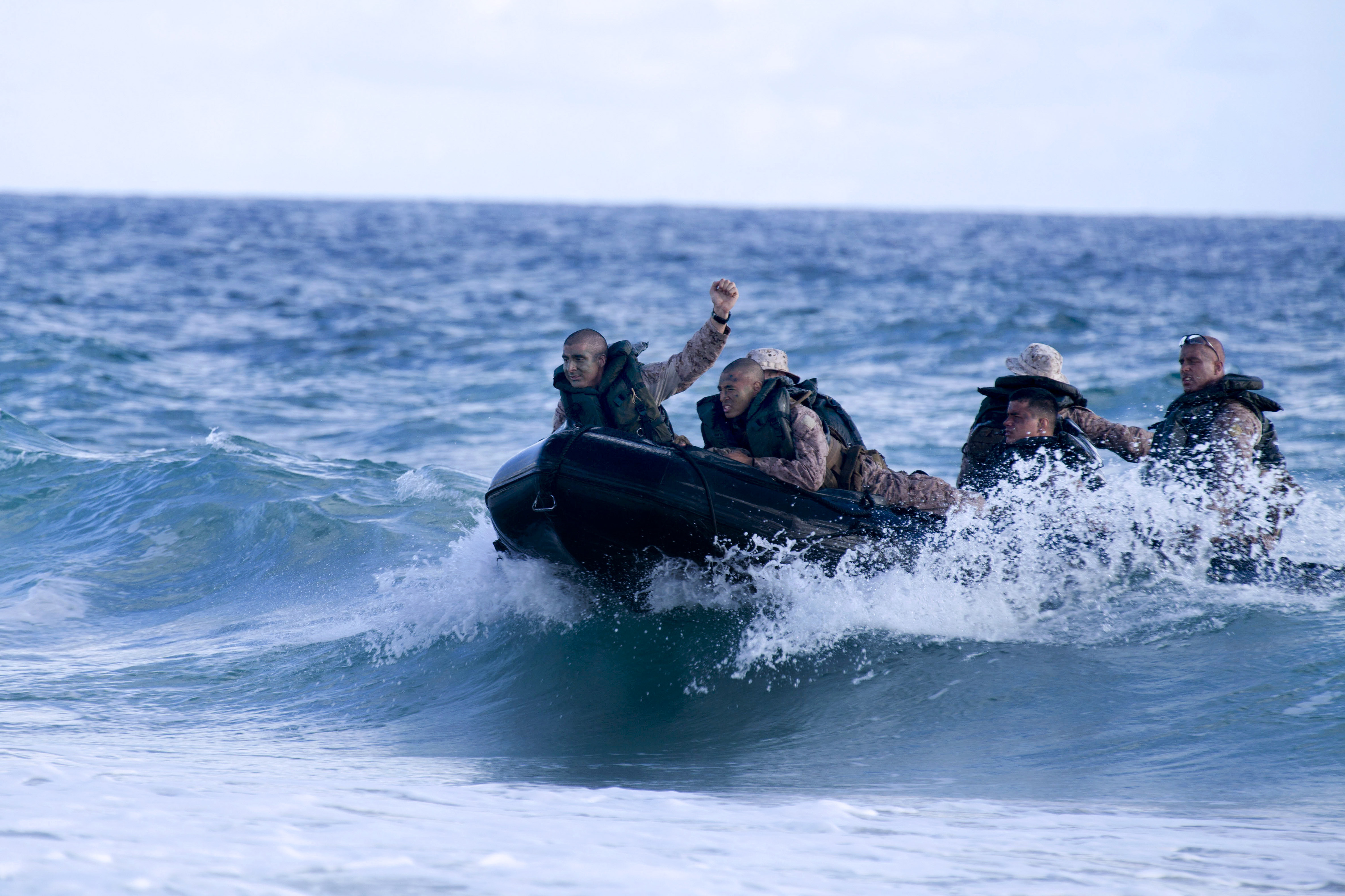 U.S. Marines execute a clandestine landing at Pyramid Rock Beach during ...