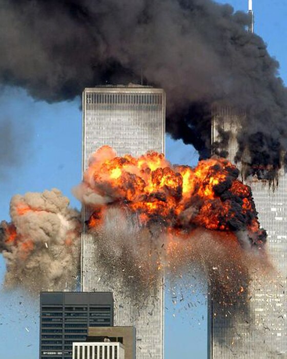 Smoke and flames billow as United Airlines Flight 175 crashes into the World Trade Center’s South Tower, Sept. 11, 2001 – killing everyone aboard and hundreds more inside the building. In New York, the crashes of two airlines hijacked by al-Qaida terrorists and the subsequent collapse of the towers killed roughly 2,800 people. (Getty Images photo by Spencer Platt/Released)