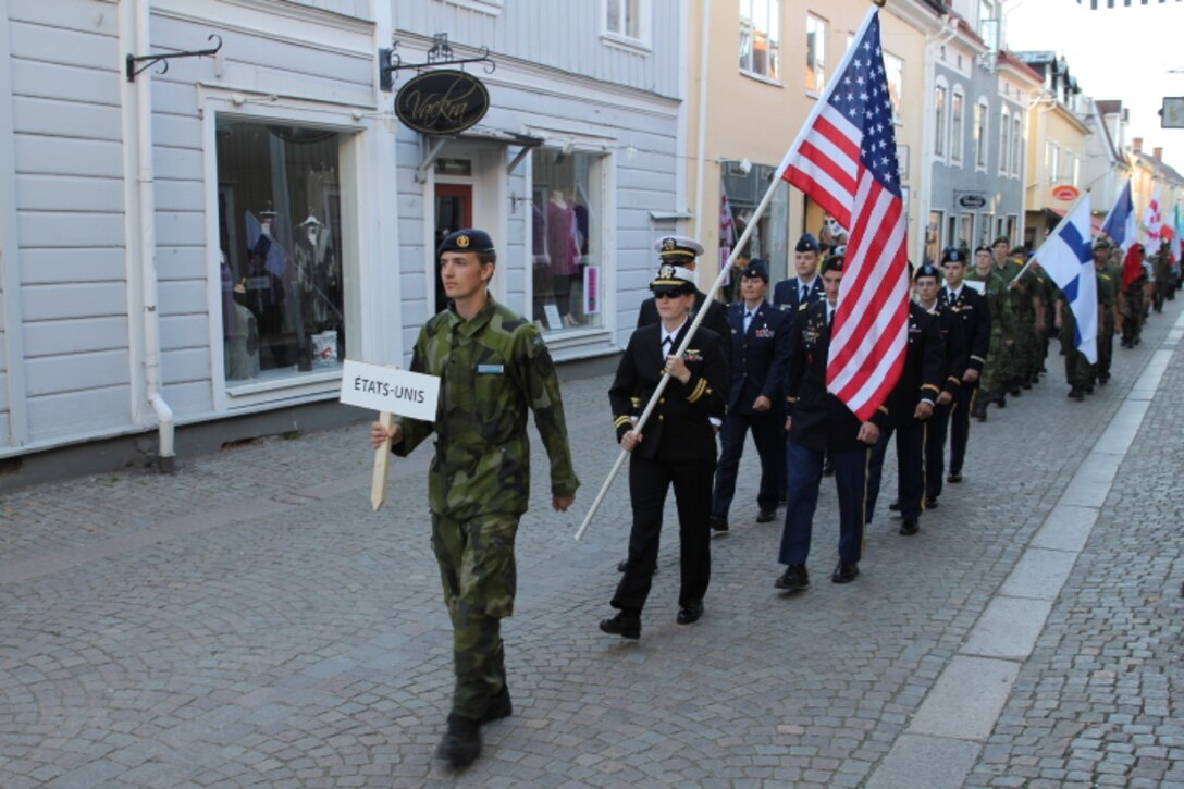 Team USA marches in to the opening ceremony of the 2013 CISM World Orienteering Military Championship hosted by the Swedish Armed Forces in Eksjo, Sweden from 26 August to 1 September.