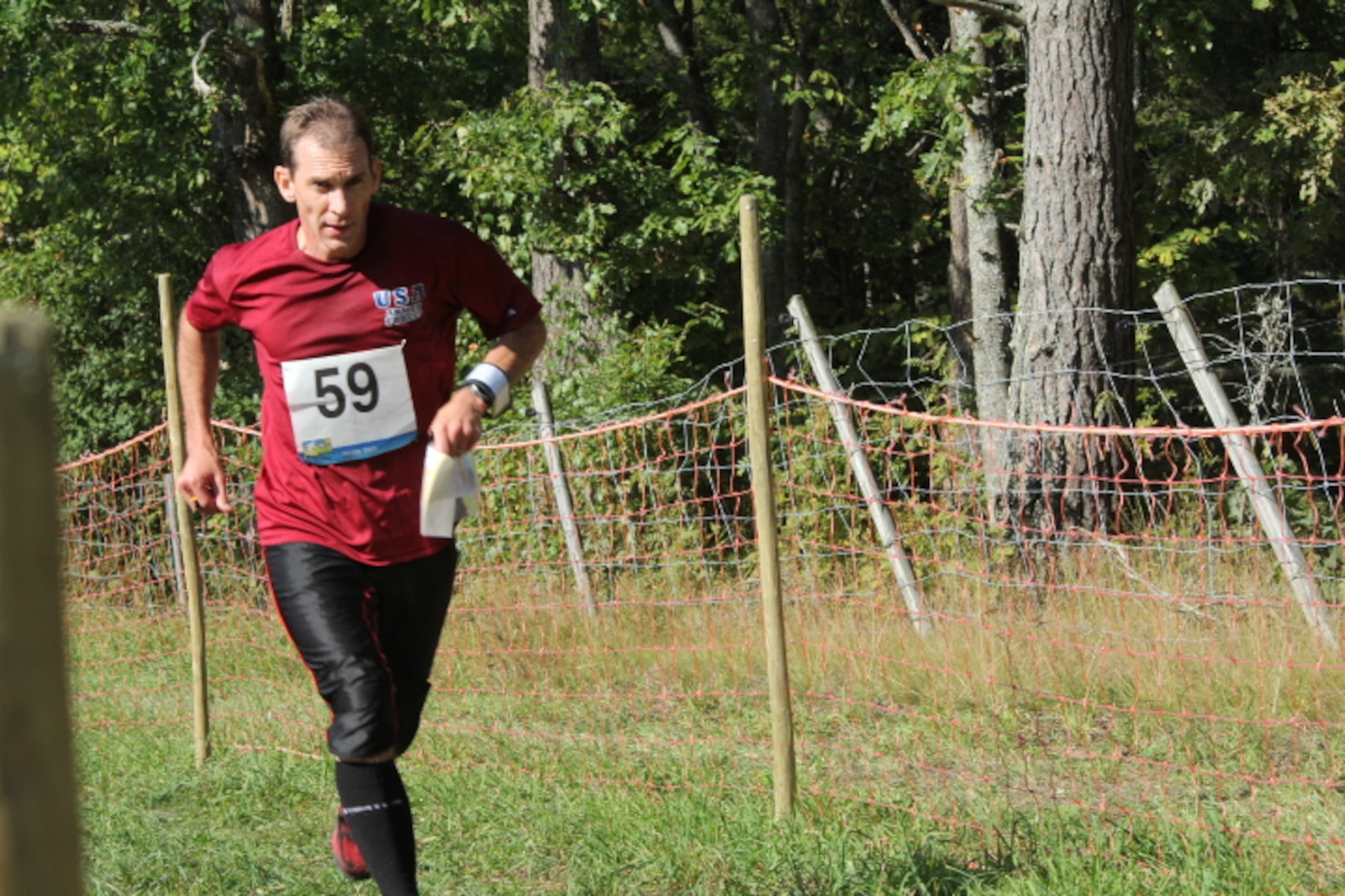 LTC Liam Collins (Army) navigating the course at the 2013 CISM World Orienteering Military Championship hosted by the Swedish Armed Forces in Eksjo, Sweden from 26 August to 1 September.
