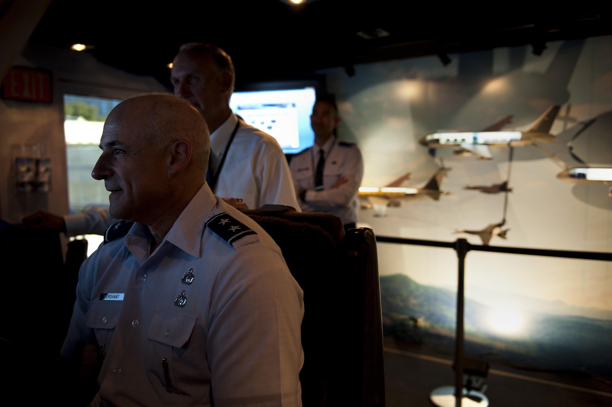 Maj. Gen. Ken Merchant, director, Global Reach Programs, Office of the Assistant Secretary of the Air Force for Acquisition, Headquarters U.S. Air Force, Washington, D.C, pilots the KC-46 refueling tanker flight simulator Sept. 4, 2013 outside of the Pentagon.