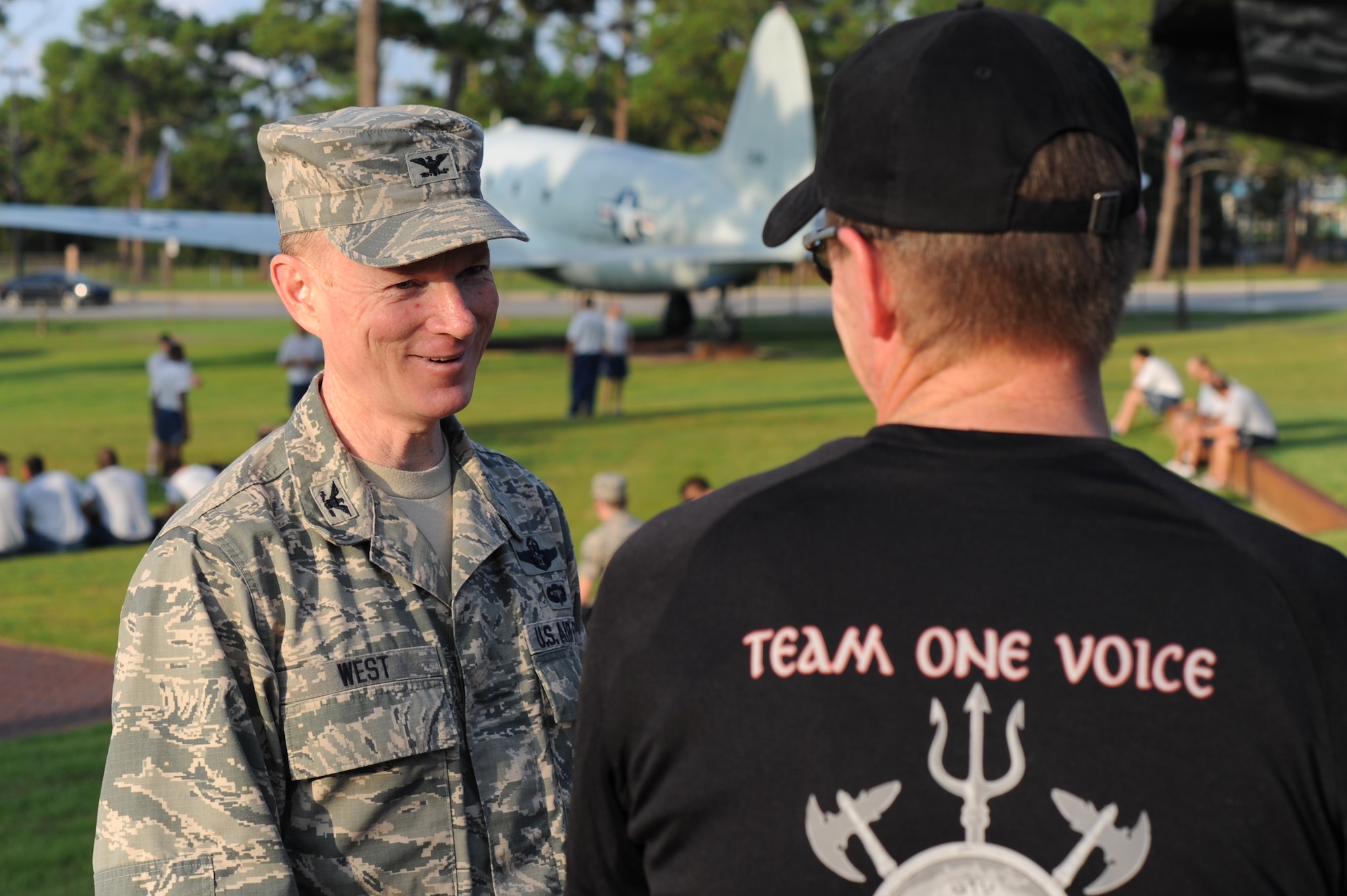 Col. Bill West, commander of the 1st Special Operations Wing, talks with Bill Stevens, Operation One Voice representative about the 7th Annual Honor Ride on Hurlburt Field, Fla., Sept. 4, 2013. This year's ride included more than 10 riders biking to Duluth, Ga., in honor of the service of Master Sgt. Joseph Deslauriers, explosive ordinance disposal technician with 1st Special Operations Civil Engineer Squadron. 
(U.S. Air Force photo/Staff Sgt. Eboni Reams)