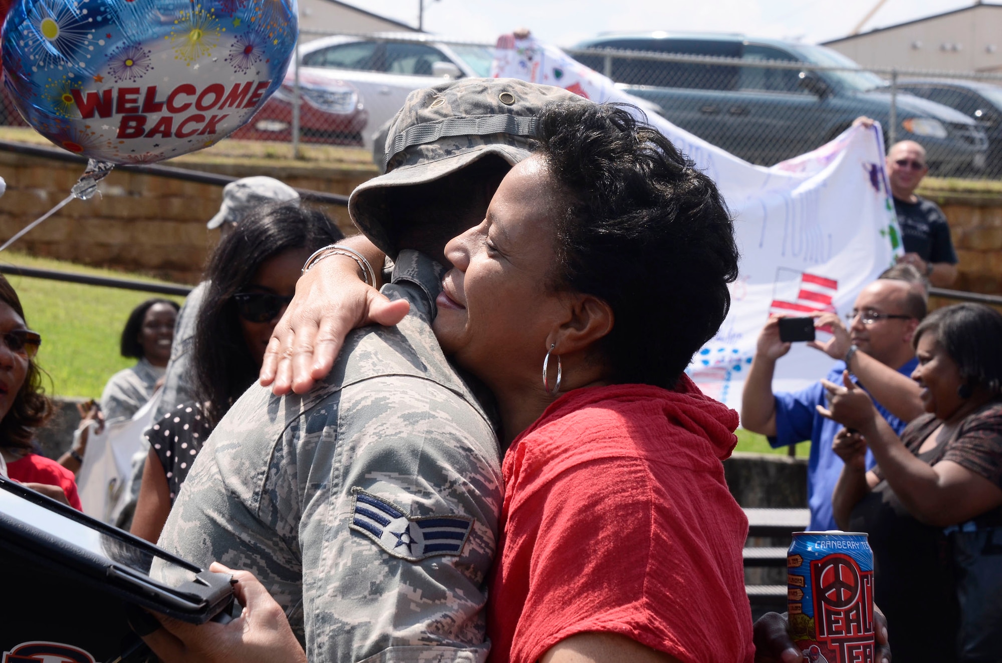Members of the 94th Security Forces Squadron were received with open arms by family, friends, and fellow reservists as they arrive back on Dobbins Air Reserve Base, Ga., from deployment to the Middle East Sep. 3. (U.S. Air Force photo/Don Peek)