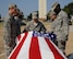 Airmen from Barksdale Honor Guard Bravo flight prepare to lift a casket during training on Barksdale Air Force Base, La., Sept. 4, 2013. These Airmen train constantly to perfect their role as Honor Guardsmen, practicing drill and ceremony during their two-week shift. (U.S. Air Force photo/Airman 1st Class Andrew Moua)