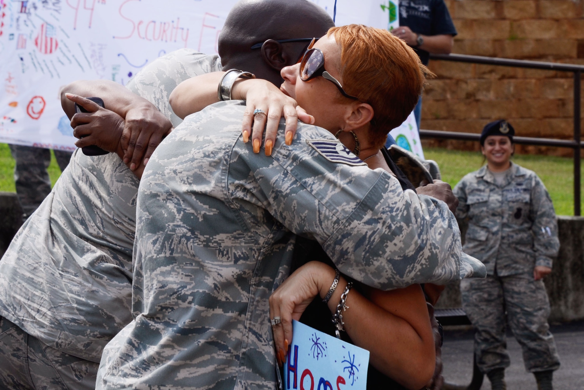 Members of the 94th Security Forces Squadron were received with open arms by family, friends, and fellow reservists as they arrive back on Dobbins Air Reserve Base, Ga., from   deployment to the Middle East Sep. 3. (U.S. Air Force photo/Don Peek)