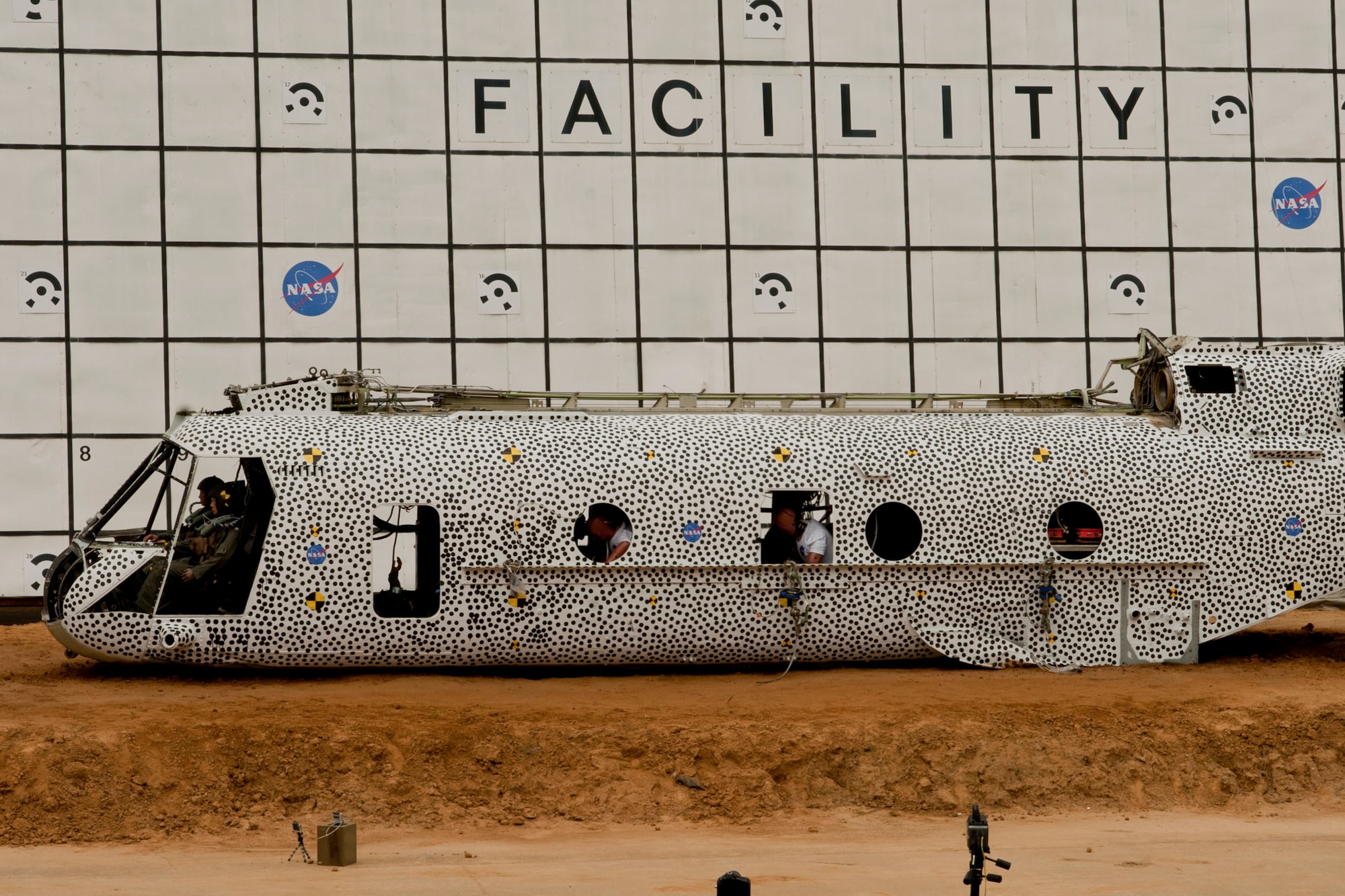 Anthropomorphic test devices, also known as test dummies, sit inside of a Sea Knight CH-46E after a controlled aircraft crash at NASA Langley Research Center in Hampton, Va., Aug. 28, 2013. The test was composed of 13 anthropomorphic test devices, two mannequins, 18 cameras aboard the aircraft, 11 cameras monitoring from outside the aircraft and approximately 350 channels of data. (U.S. Air Force photo by Staff Sgt. Stephanie Rubi/Released)