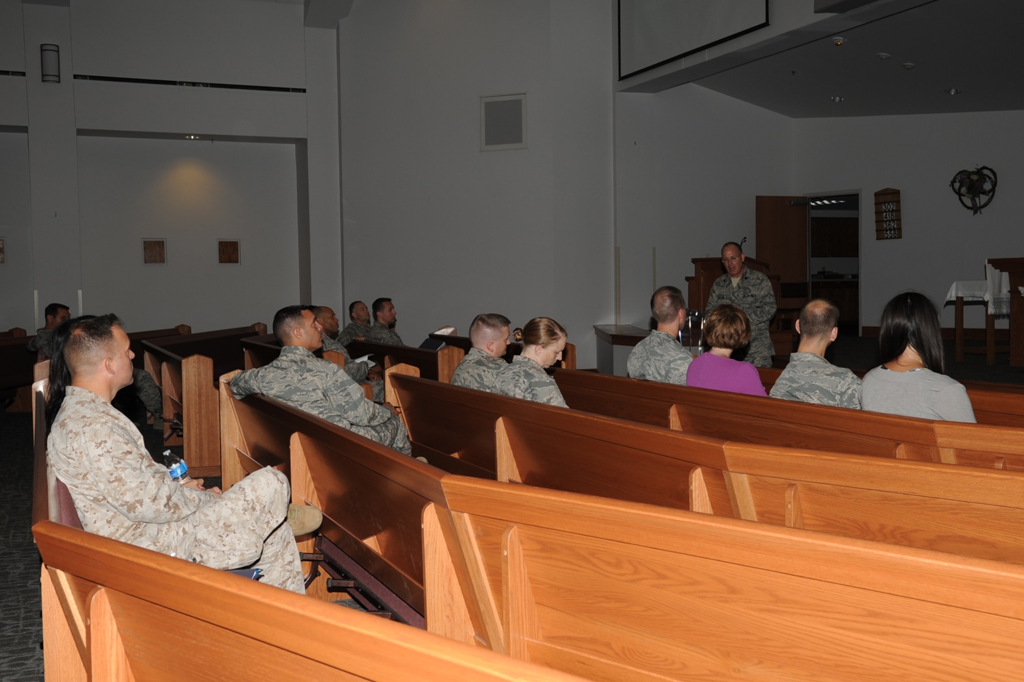 GOODFELLOW AIR FORCE BASE, Texas -- Chaplain (Lt. Col.) Steven Nicolai, 17th Training Wing, briefs new commanders and spouses Aug. 28 about chapel services and programs offered.  Team Goodfellow provided a two day commanders’ and spouses’ immersion program to provide them an opportunity to see some of the programs offered at Goodfellow. (U.S. Air Force photo/Staff Sgt. Laura R. McFarlane)