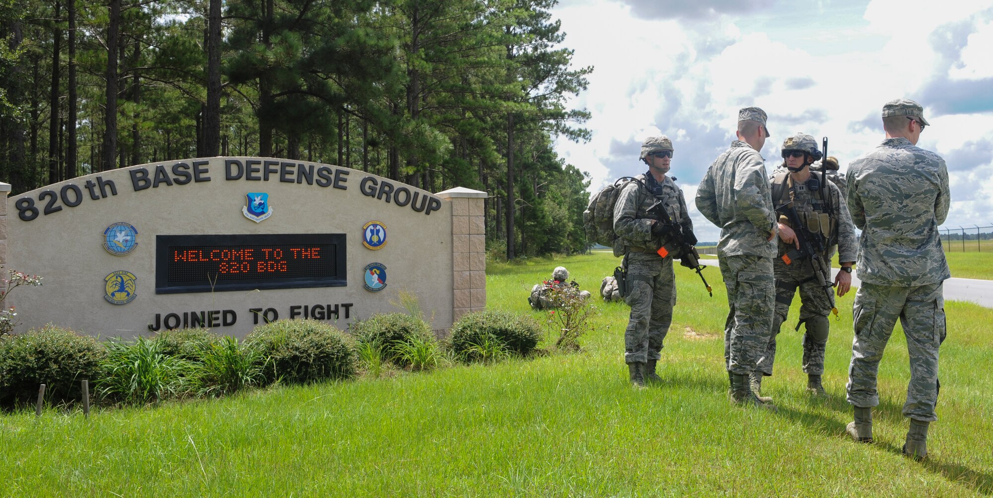 U.S. Air Force Col. Paul Kasuda, 820th Base Defense Group commander, receives a briefing during the Safe Guardian exercise at Moody Air Force Base, Ga., Aug. 23, 2013. The week-long exercise helped Airmen learn the proper ways to execute certain missions. (U.S. Air Force photo by Airman Alexi s Grotz/Released) 