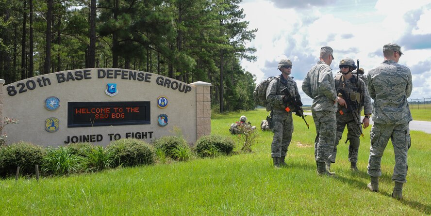 U.S. Air Force Col. Paul Kasuda, 820th Base Defense Group commander, receives a briefing during the Safe Guardian exercise at Moody Air Force Base, Ga., Aug. 23, 2013. The week-long exercise helped Airmen learn the proper ways to execute certain missions. (U.S. Air Force photo by Airman Alexi s Grotz/Released) 