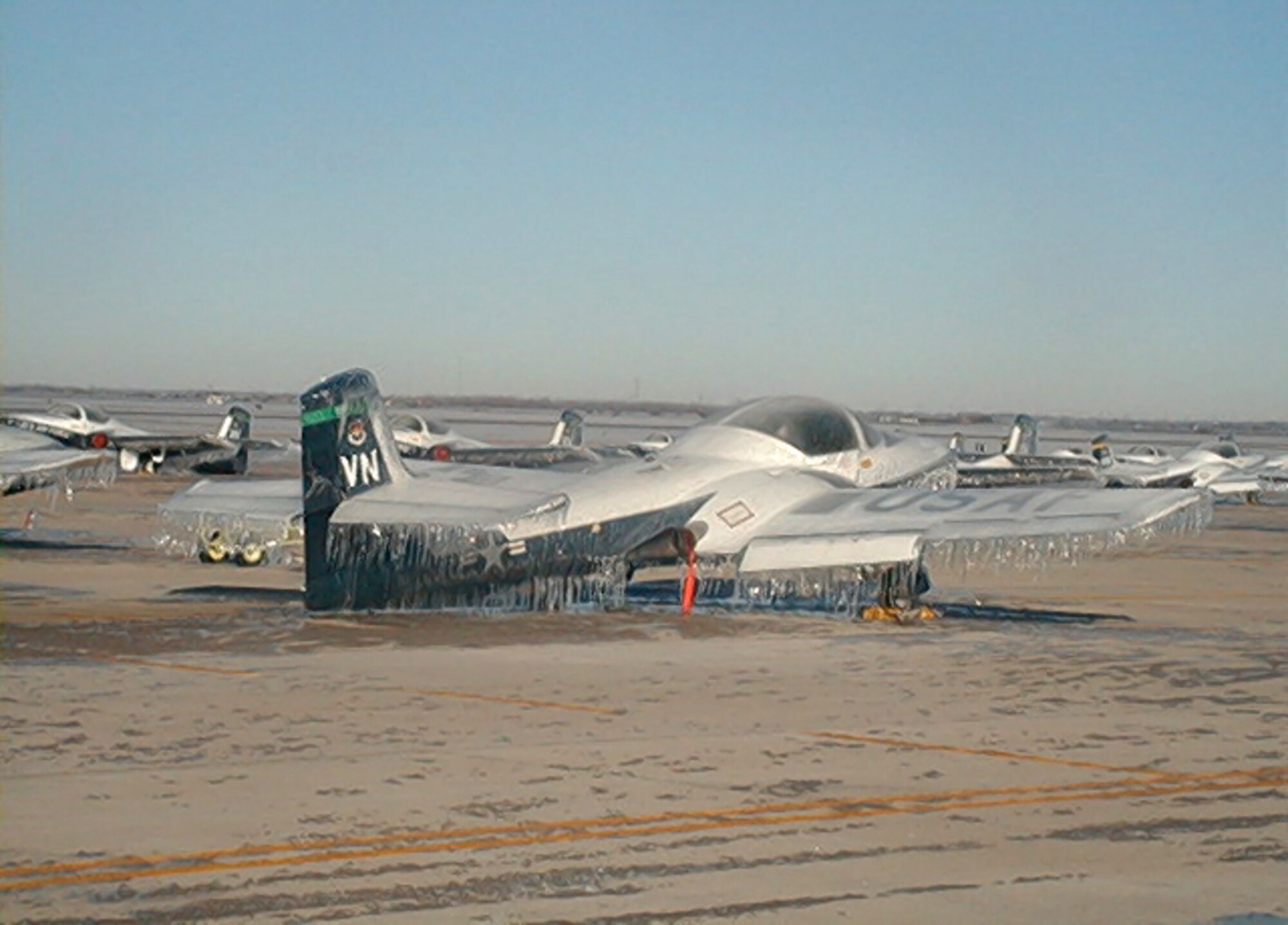 Ice storms, like a past one that covered aircraft in the open at Vance Air Force Base, are one of many forms severe weather can take in Oklahoma. September is National Preparedness Month. (Courtesy photo)